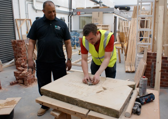 Master mason Altomont Townsend supervises student John RobertsCopyright © http://www.chesterfootballhistory.com